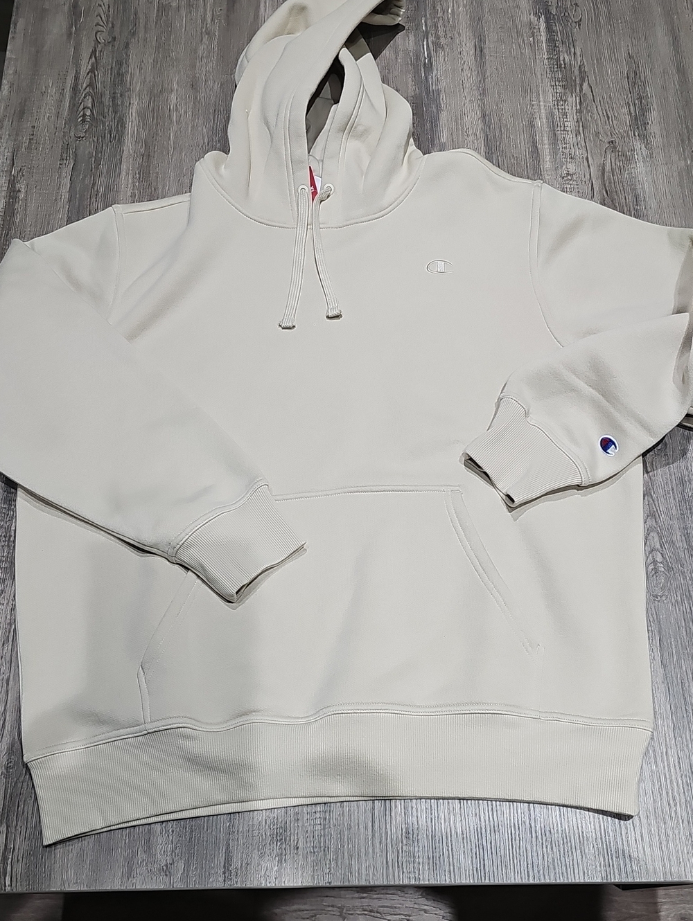 Champion Cream Pullover Hoodie with Subtle Logo